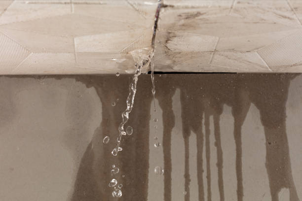 Professional Flood Damage Cleanup technician working in Byesville, OH